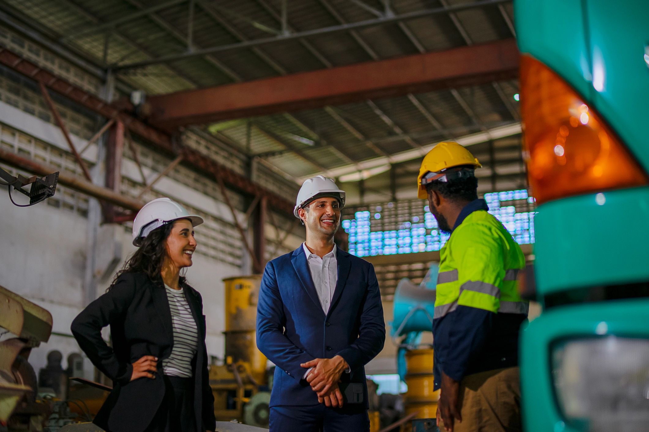 Engineer meeting with business owner at construction site